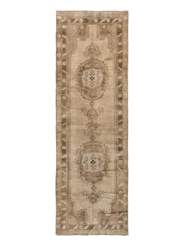 An Oushak "Corridor" Rug: An Oushak "Corridor" Rug West Anatolia, Circa 1900 15 feet 1 inch x 5 feet 3 inches. Property from a Private Family Trust This lot is located in Chicago. ConditionChemically washed to neutralize the