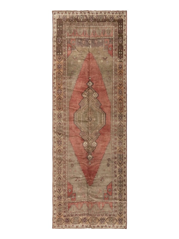 An Oushak "Corridor" Rug: An Oushak "Corridor" Rug West Anatolia, Late 19th Century 11 feet 8 inches x 5 feet. Property from a Private Family Trust This lot is located in Chicago.