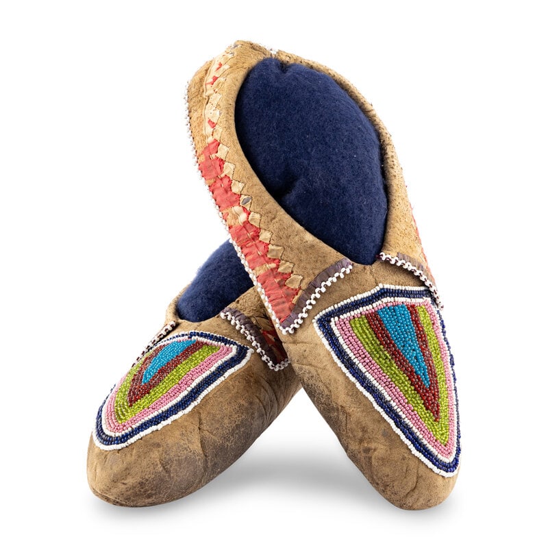 Delaware Beaded Hide Moccasins: Delaware Beaded Hide Moccasins third quarter 19th century thread-sewn and beaded using colors of white, cobalt, pink, chartreuse, rose, and pony trader blue; silk ribbon detailing on cuffs length 10