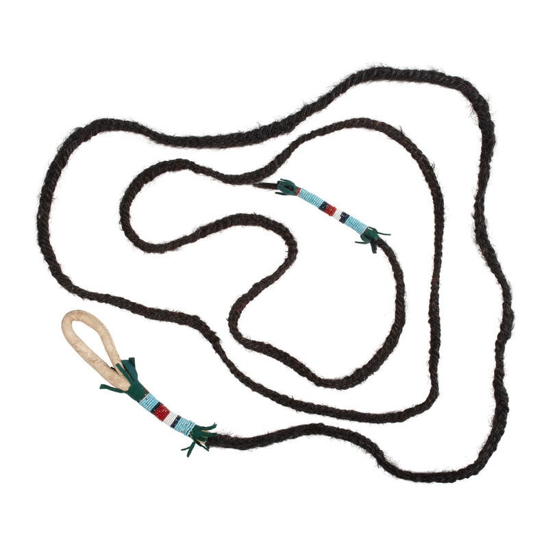 Apsáalooke [Crow] Braided Buffalo Hair Rope: Apsáalooke [Crow] Braided Buffalo Hair Rope ca 1900 thread-sewn hide handle; beaded detailing in light blue, translucent red, and white; green felt length 141 inches This lot is located in