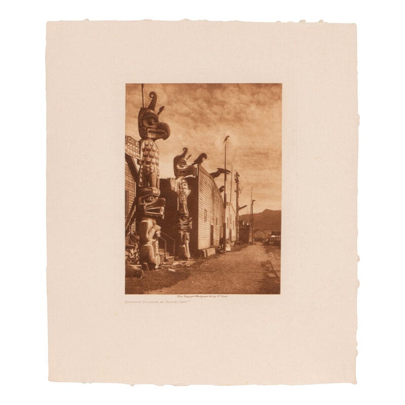 Edward S. Curtis (American, 1868-1952) Nimkish Village at Alert Bay: Edward S. Curtis(American, 1868-1952)Nimkish Village at Alert Bayphotogravure 1914, from a copyright photograph by E.S. Curtis. Watermark lower left. (sight) 12-7/8 x 11 inches; (frame) 16-7/8 x