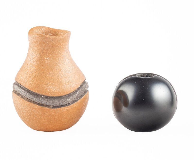 Dominique Toya (Jemez, 1971-2023) Miniature Micaceous Pottery: Dominique Toya(Jemez, 1971-2023)Miniature Micaceous Pottery lot of 2, includes: a buff and black jar; signed on base, height 3-1/4 inches x diameter 2-1/2 inches a spherical black jar; signed on