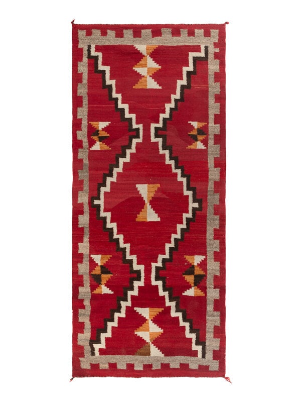 Navajo Western Reservation Weaving [Rug]: Navajo Western Reservation Weaving [Rug] second quarter 20th century flat weave, woven in colors of red, gray, gold, cream, and brown; with an overall hourglass pattern 93-1/2 x 46 inches Property