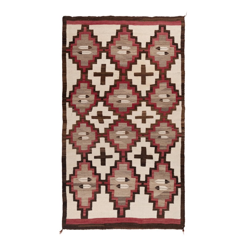 Navajo Crystal Pattern Weaving, with Feathers and Crosses [Rug]: Navajo Crystal Pattern Weaving, with Feathers and Crosses [Rug] second quarter 20th century woven in colors of red, brown, and cream; featuring a repeating serrated diamond pattern 78-3/4 x 46-1/4