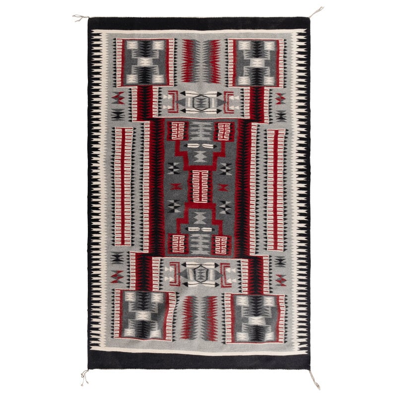 Navajo Storm Pattern Weaving [Rug]: Navajo Storm Pattern Weaving [Rug] second half 20th century designed with a heavily serrated storm pattern 78-1/2 x 53-1/2 inches Property of the Gichigamiin I