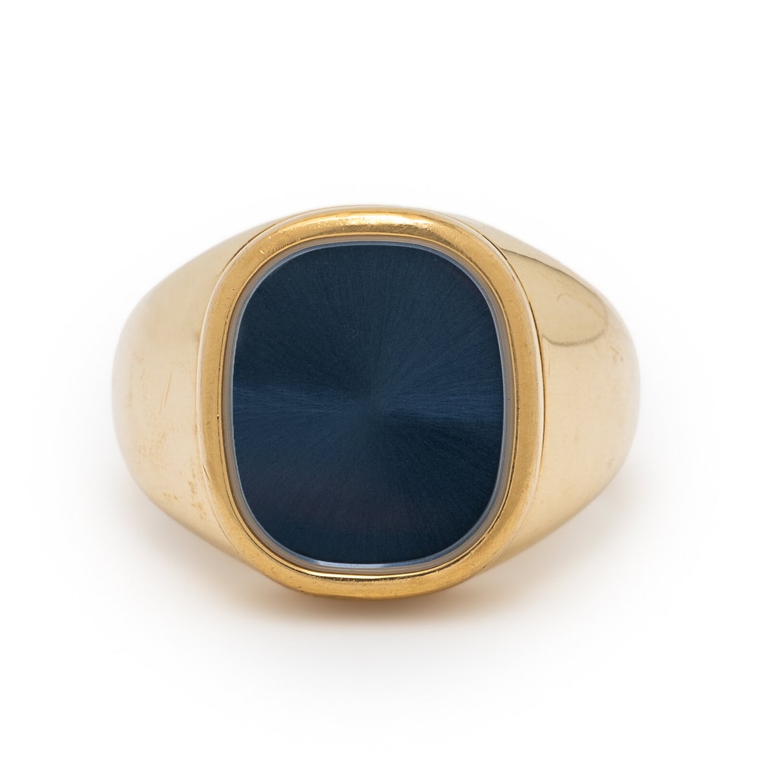 Patek Philippe, 18K Yellow Gold 'Ellipse' Ring: Patek Philippe, 18K Yellow Gold 'Ellipse' RingFeaturing a blue ellipse measuring approximately 14.00 x 12.00 mm. Mounted in 18 karat yellow gold. Ring size 8 1/4.Stamp: PATEK PHILIPPE GENEVE (maker's