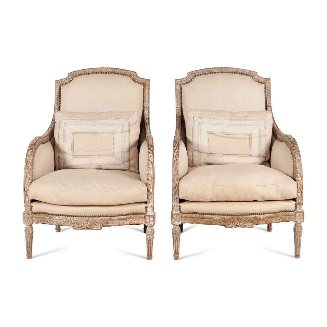 A Pair of Louis XVI Carved and Painted Bergères: A Pair of Louis XVI Carved and Painted Bergères 18th Century the underside of the seat rail stamped 'CARLHIAN'. Height 38 x width 28 x depth 29 inches. Property from the Wetherill Family Collecti