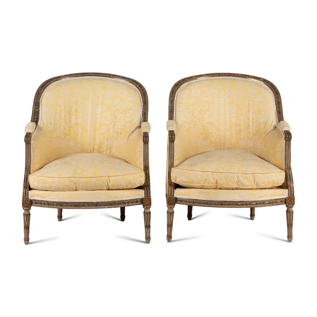 A Pair of Louis XVI Painted and Parcel Gilt Bergères: A Pair of Louis XVI Painted and Parcel Gilt Bergères Late 18th Century Height 35 1/4 x width 28 1/2 x depth 25 inches. Property of a California Collector This lot is located in Chicago. Provenanc