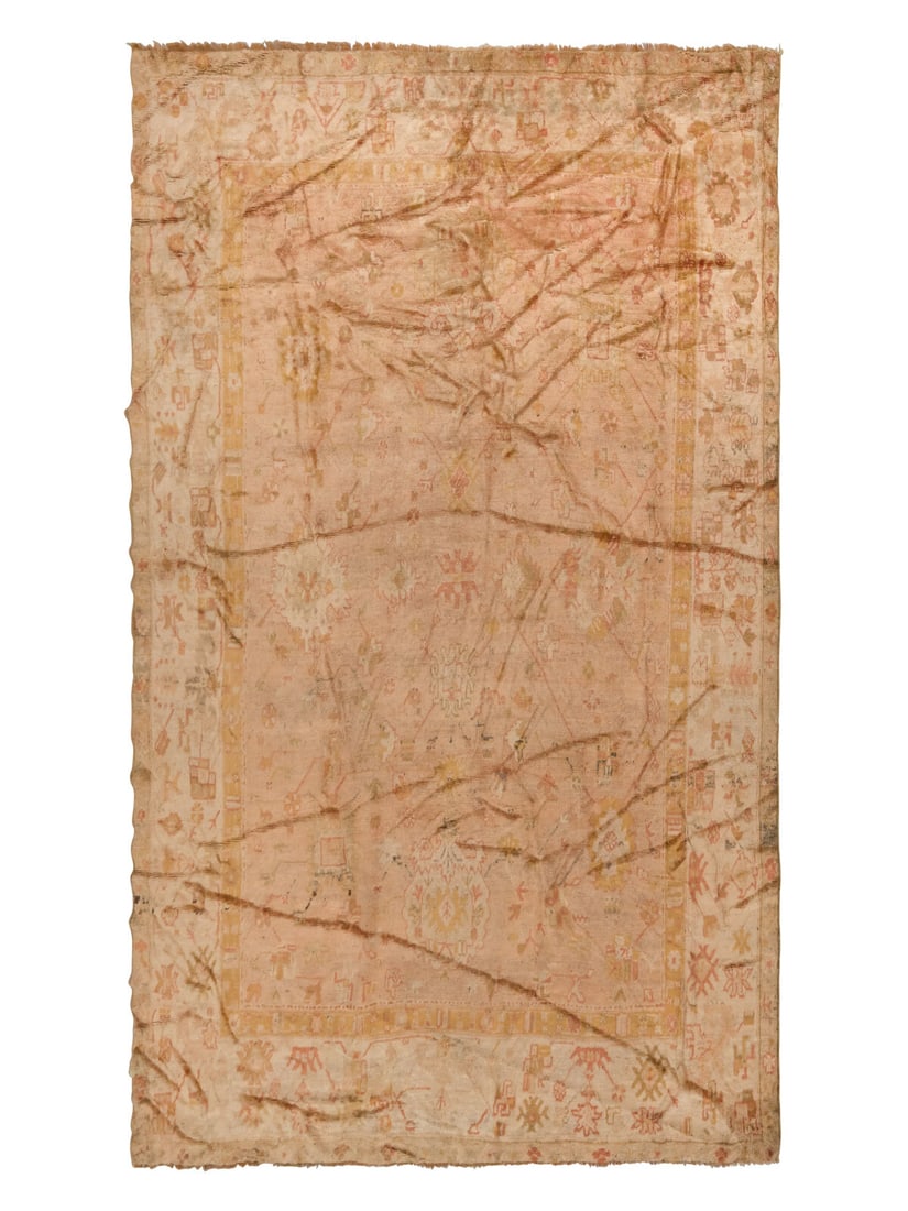 An Oushak Carpet: An Oushak Carpet West Anatolia, Late 19th Century 14 feet 1 inch x 11 feet 2 inches. Property from a Private Family Trust This lot is located in Chicago.