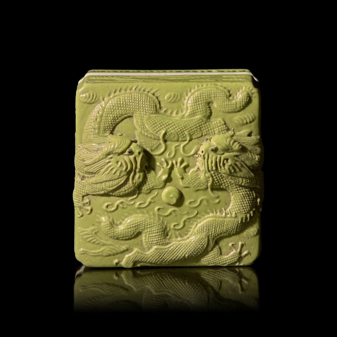 A Chinese Lime-Green Glazed Porcelain 'Dragons' Square Seal Paste Box and Cover, Late Qing Dynasty, (1 of 4)