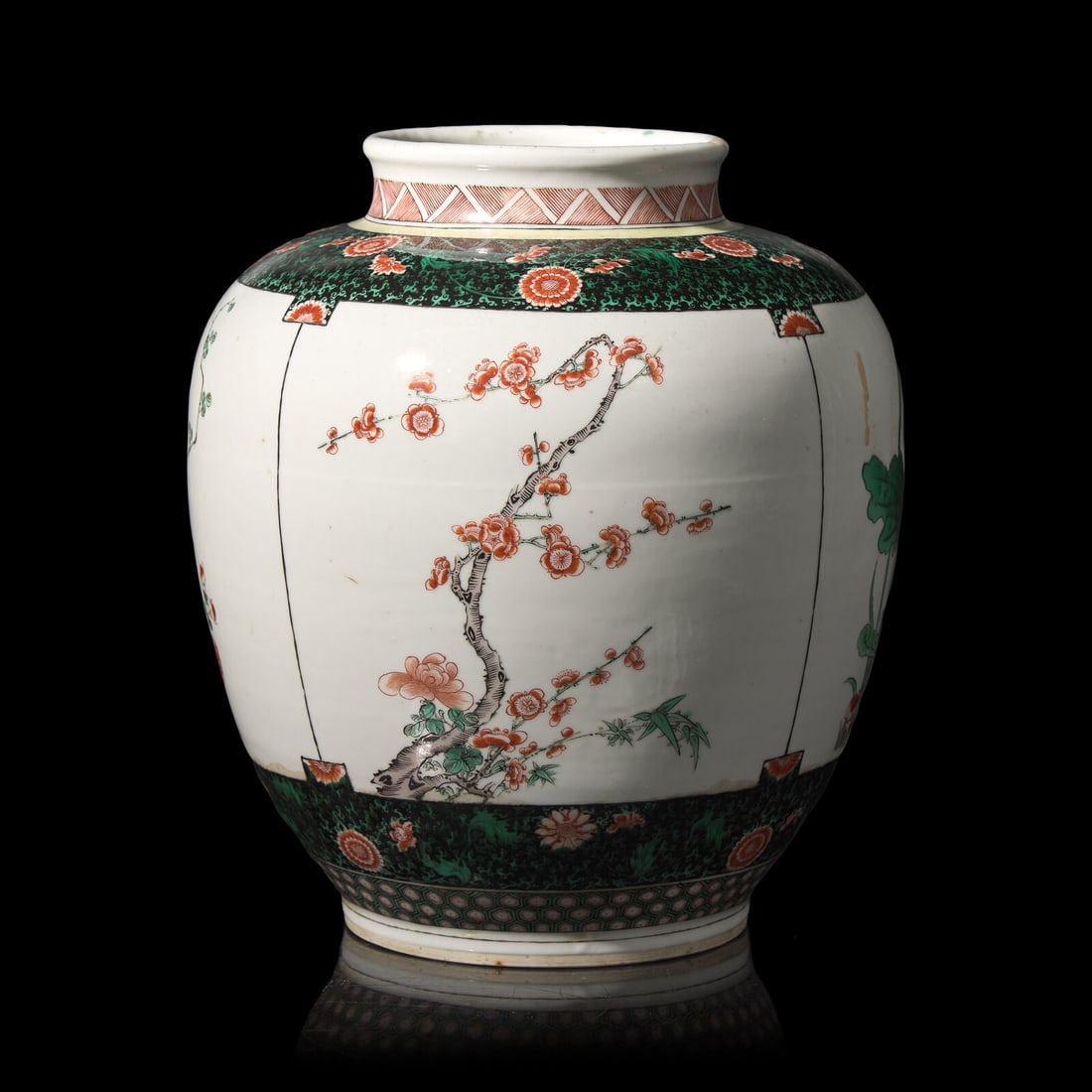 A Chinese Famille Verte Porcelain Jar, 19th Century 晚清 素三彩花: A Chinese Famille Verte Porcelain Jar, 19th Century 晚清 素三彩花卉纹罐 The large globular body decorated with alternating panels enclosing floral