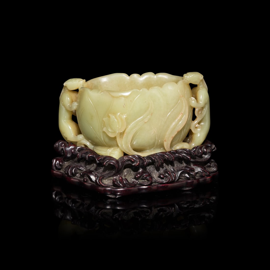 A Chinese Yellow Jade 'Lotus' Washer 黃玉荷葉式洗: A Chinese Yellow Jade 'Lotus' Washer 黃玉荷葉式洗 With wood stand. Length 4 1/8 in., 10.5 cm. Property from a Georgia Collector. This lot is located in Chicago. Pro