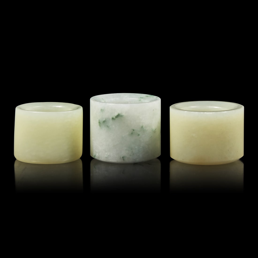 A Group of Three Chinese Jade and Jadeite Archer's Rings 翡翠及玉扳 (1 of 3)