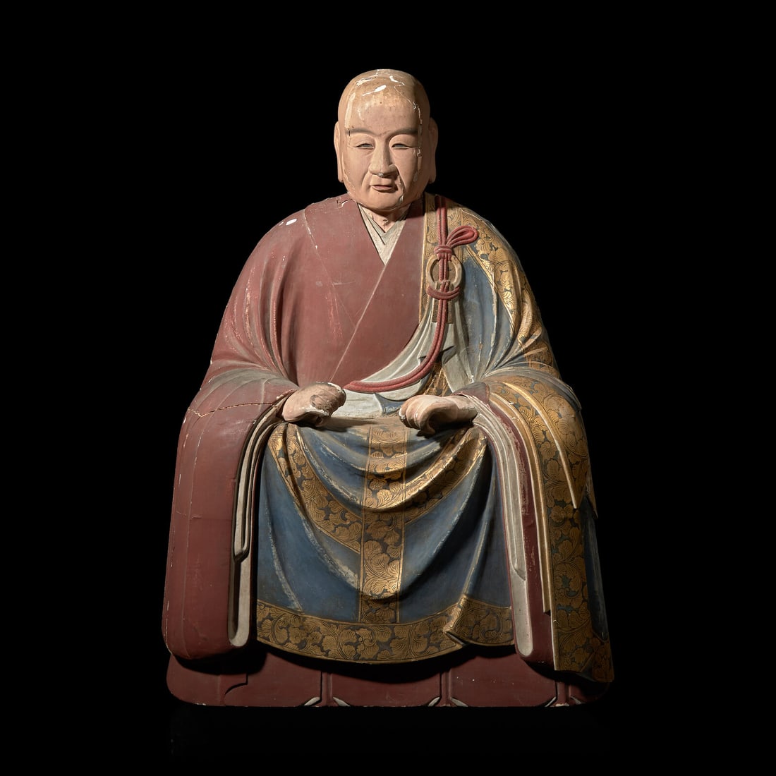 A Japanese Polychrome Painted Wood Figure of a Rakan (1 of 3)