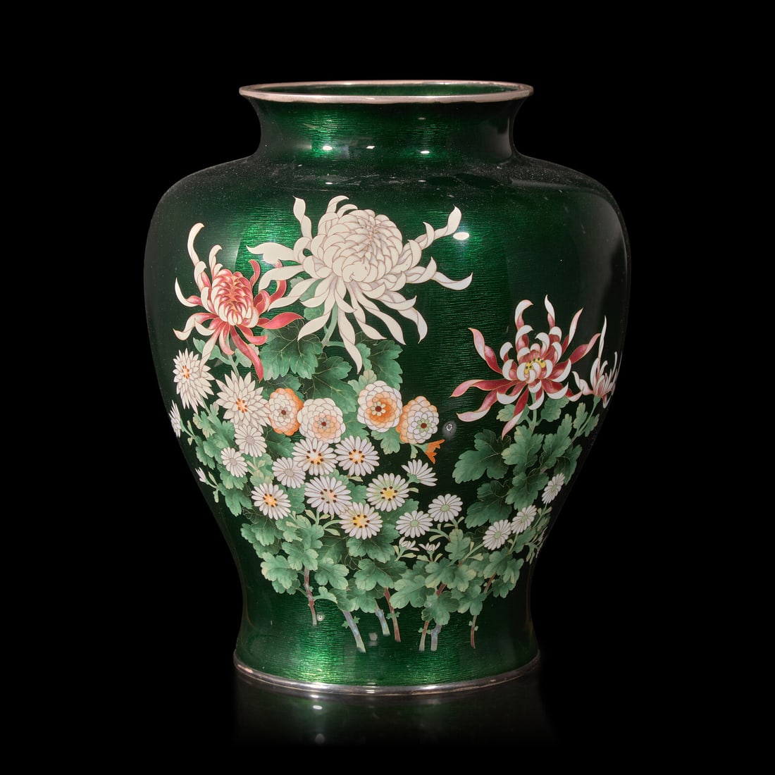 A Japanese Green Ground Cloisonné Vase, Ando Jubei Studio: A Japanese Green Ground Cloisonné Vase, Ando Jubei Studio The sloping walls ending in a splayed foot, topped with a recessed neck and a flared silvered rim, the exterior decorated with floral blo