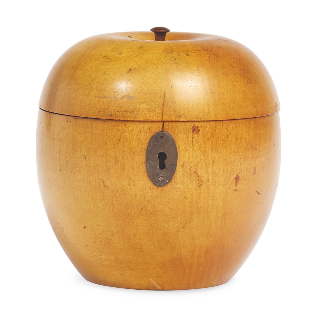 A George III Fruitwood Apple-Form Tea Caddy: A George III Fruitwood Apple-Form Tea Caddy Late 18th / Early 19th Century Height 4 1/2 x diameter 4 3/8 inches (at widest). This lot is located in Philadelphia.