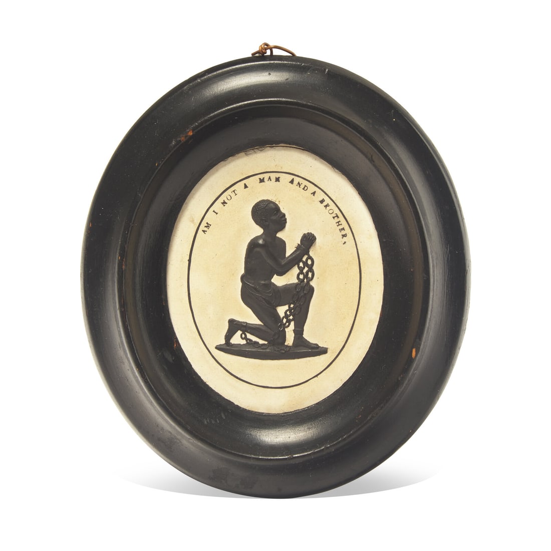 A Wedgwood Caneware and Black Basalt Oval Plaque: "Am I Not a Man and a Brother?" (1 of 2)