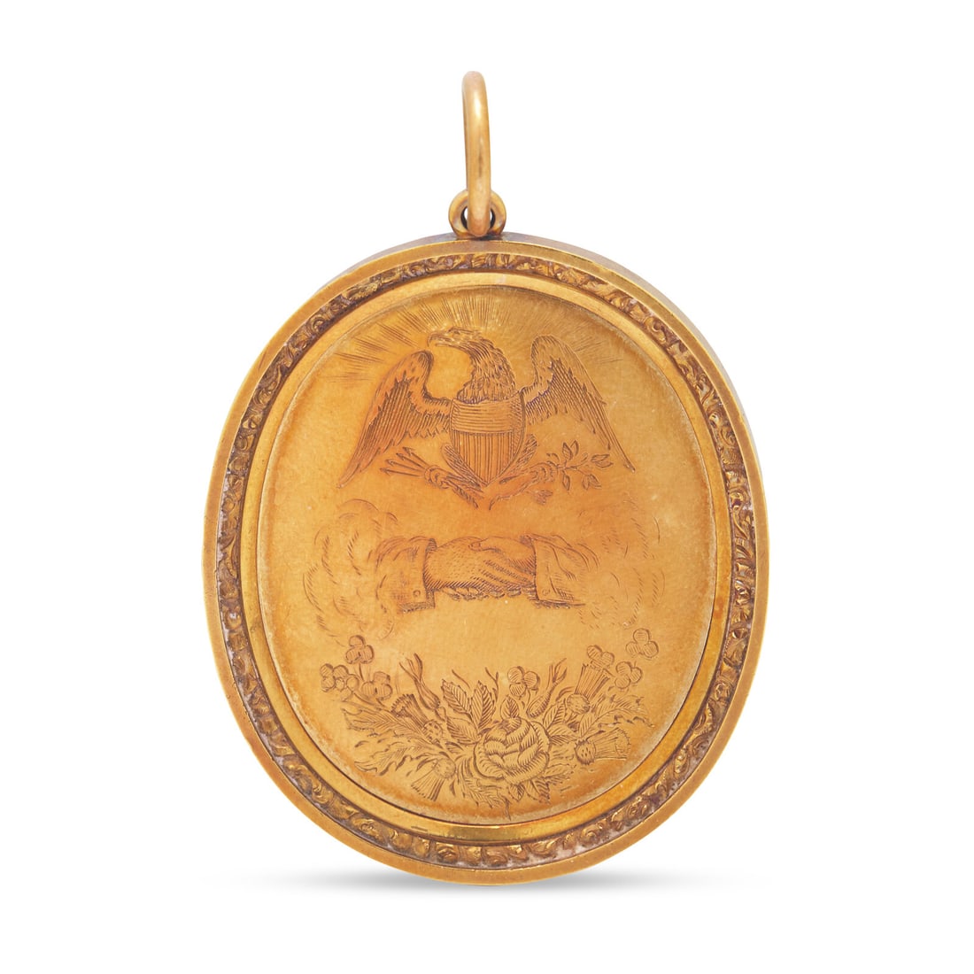 An Engraved Gold Presentation Pendant: An Engraved Gold Presentation Pendant Dated, "1839" one side engraved with emblazoned eagle and shield over shaking hands and floral spray with rose, thistles, and shamrocks, the other side engraved w