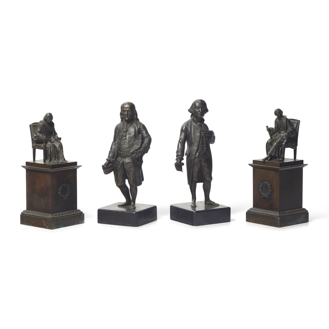 A Group of Four Patinated Bronze Figures or Bookends (1 of 3)