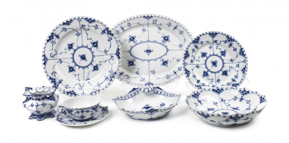 A Royal Copenhagen Partial Dinner Service, Diameter of : A Royal Copenhagen Partial Dinner Service, in the Blue Fluted Half Lace pattern, comprising 8 dinner plates, 10 salad plates, 11 bread plates, 12 tea cups, 15 saucers, 1 serving dish, 2 serving bowls,