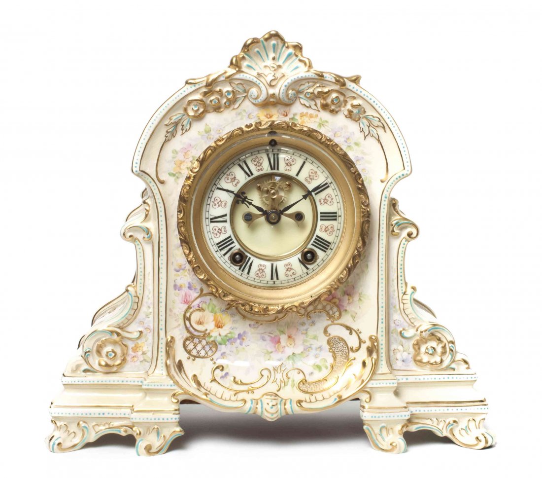 An Ansonia Porcelain All Time Clock, Height 11 3/4 x wi: An Ansonia Porcelain All Time Clock, early 20th century, having Sarreguemines pottery case, with enameled dial, marked R.F. Polack Jewellers, York, Pennsylvania, 5-10-11. Height 11 3/4 x width 13 x de