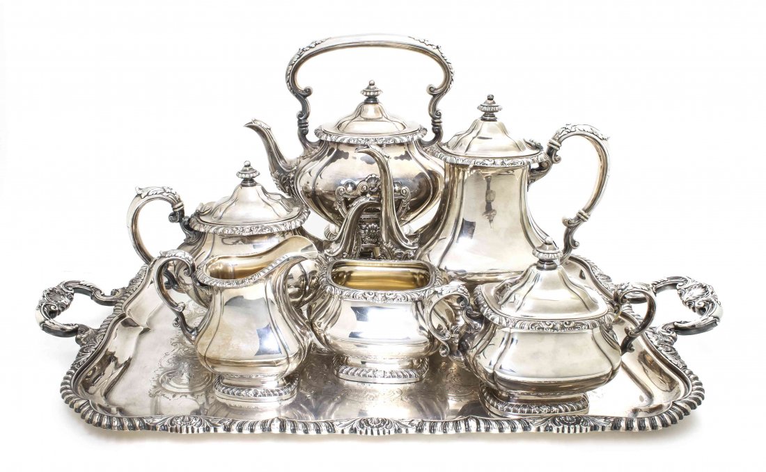 A Gorham Silverplate Tea and Coffee Service, Height of : A Gorham Silverplate Tea and Coffee Service, comprised of a tray, hot water kettle, tea pot, coffee pot, creamer and sugar. Height of kettle 8 inches. Property from the Collection of Marilyn Callender