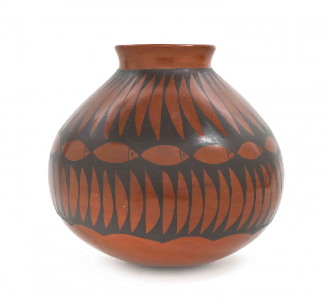 A Black on Redware Water Carrier, Jose Gonzalez, Height: A Black on Redware Water Carrier, Jose Gonzalez, signed on bottom. together with a blackware vase having gunmetal finish. Height of tallest 10 1/2 inches.