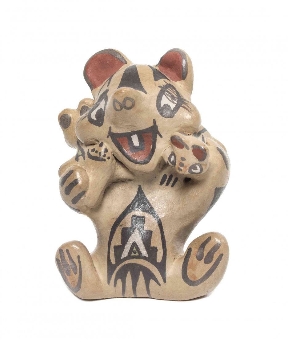 A Santa Clara Storyteller, Margret and Luther, Height 3: A Santa Clara Storyteller, Margret and Luther, in the shape of a bear with two figures. Height 3 1/4 x width 2 1/4 inches. Property from the Collection of Mary E. Dolan, Chicago, Illinois