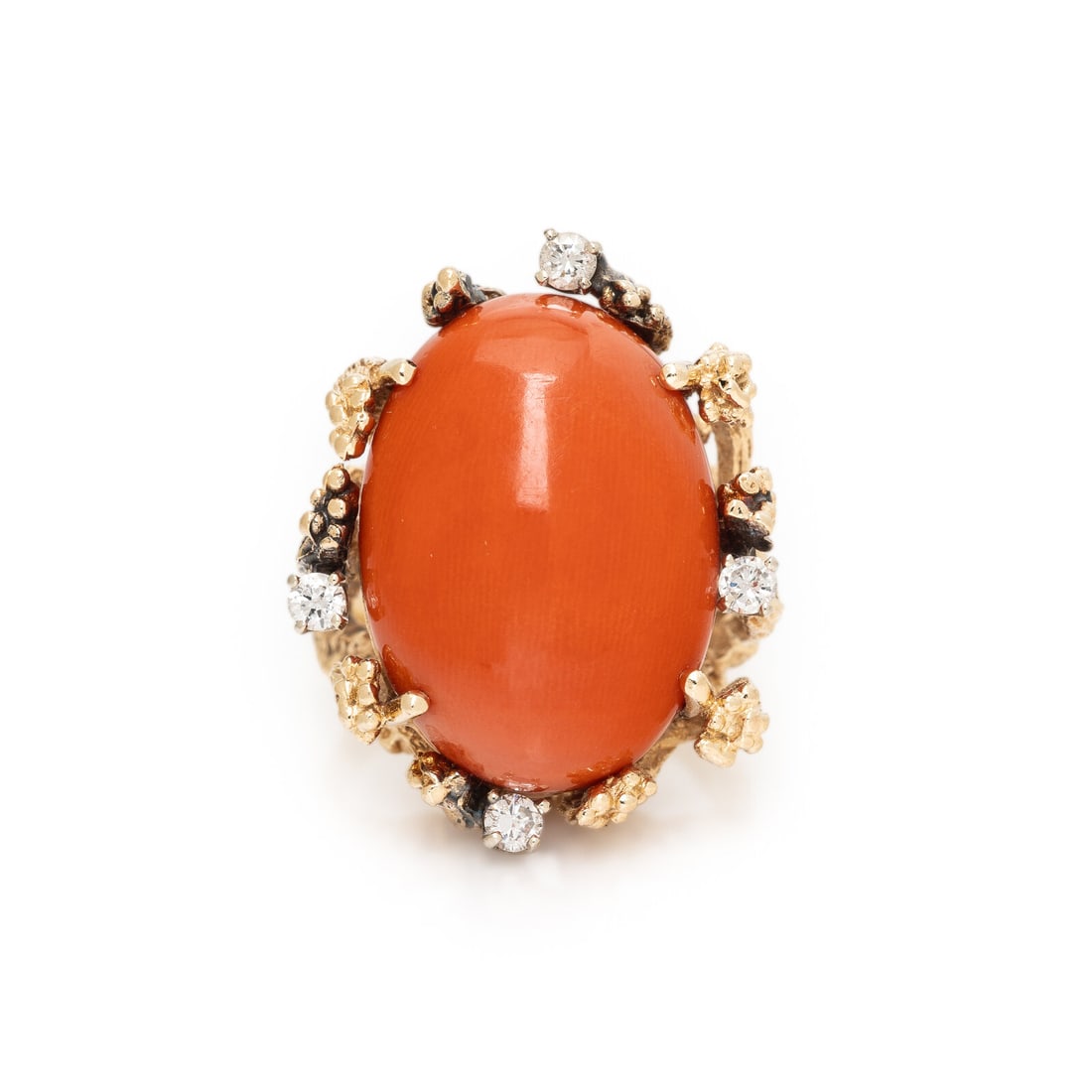 Coral, Diamond, and Yellow Gold Ring: Coral, Diamond, and Yellow Gold Ring Oval cabochon coral measuring approximately 21.80 x 16.00 x 8.15 mm and round diamonds. 14 karat yellow gold. Ring size 7. Stamp: 14K. Gross weight: 9.40 dwt.