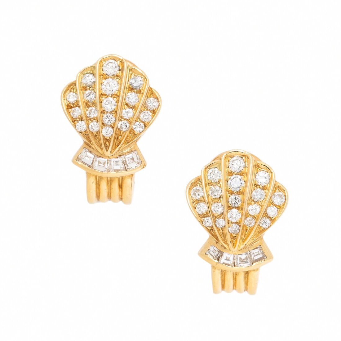 Yellow Gold and Diamond Shell Earrings: Yellow Gold and Diamond Shell Earrings Round and channel-set square step cut diamonds. 18 karat yellow gold. 3/4 inch long. Stamp: FRANCE 18K. Gross weight: 6.85 dwt. Property of a Philadelphia Main
