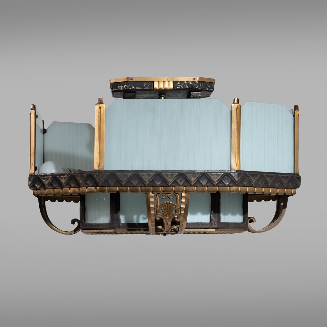 Art Deco Chicago, c. 1929 Bronze and Glass Lighting Fixture From the Palmolive Building: Art Deco Chicago, c. 1929 Bronze and Glass Lighting Fixture From the Palmolive Building with one pane broken but present. bronze, glass, steel, hardware 14 ½ h × 25 w × 17 ¼ d in. 