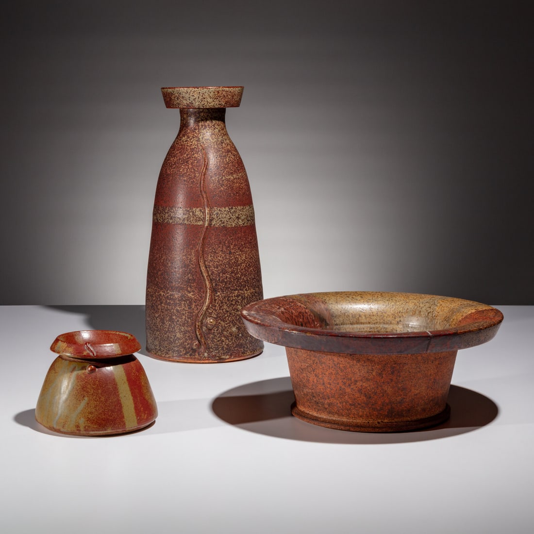 Ted Randall (American, 1914–1985) Three Ceramic Items: Ted Randall (American, 1914–1985) Three Ceramic Items etched signatures to undersides glazed earthenware 16 h × 7 ¼ dia in. | tallest From the collection of Paul and Lillian Slater, En