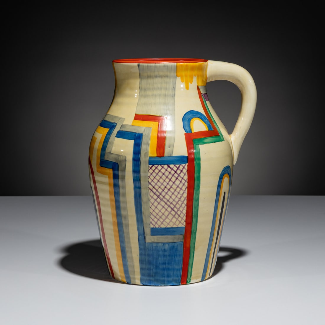 Clarice Cliff (English, 1899–1972) Tennis Jug: Clarice Cliff (English, 1899–1972) Tennis Jug hand-glaze painted ceramic stamped signature to underside 11 ½ h × 8 ½ w × 8 d in. Property from the Collection of Richard B. Ku