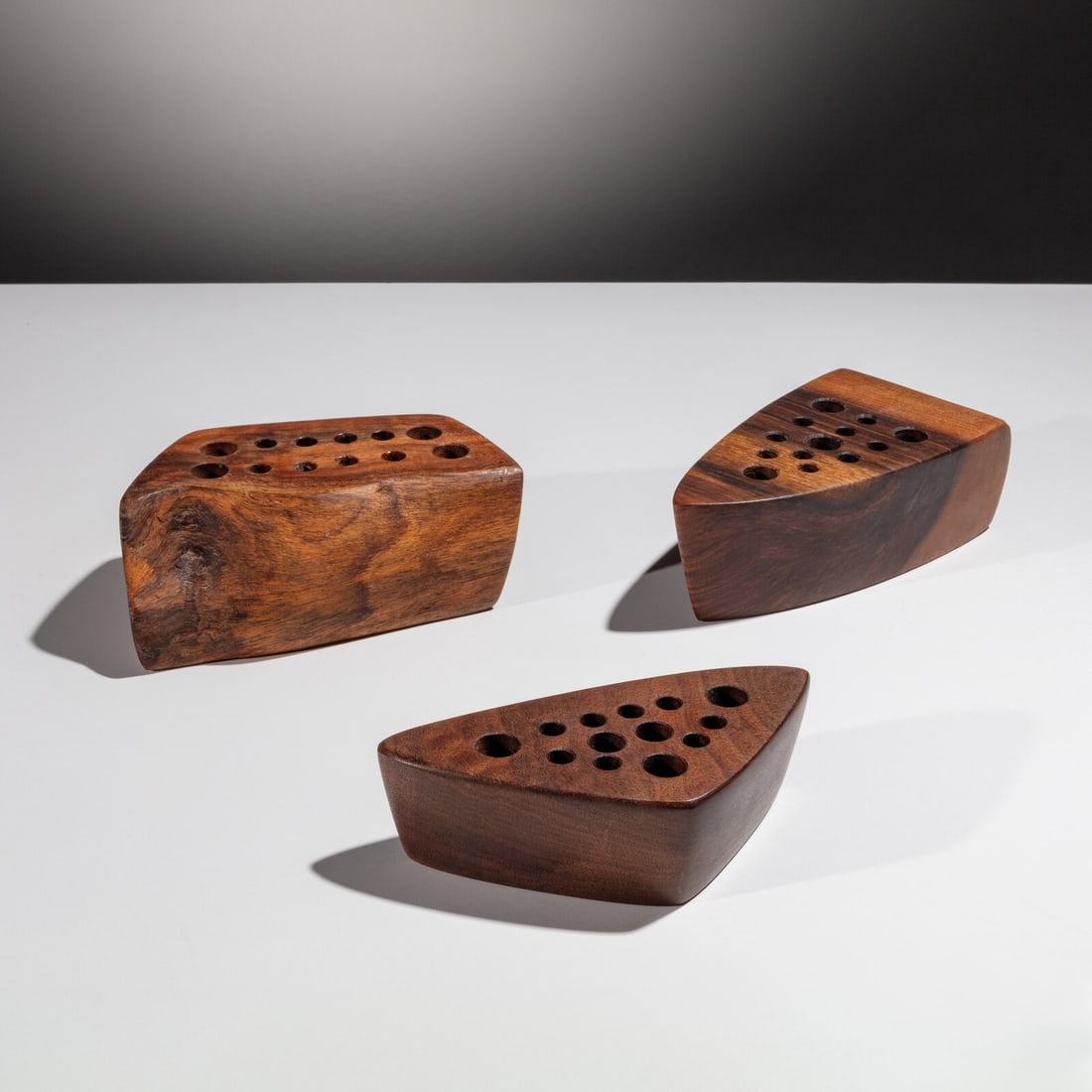 George Nakashima (American, 1905–1990) Group of 3 Pencil Holders, 1984: George Nakashima (American, 1905–1990) Group of 3 Pencil Holders, 1984 each signed and dated in marker to the underside American black walnut, English walnut 2 ¼ h × 5 ½ w × 