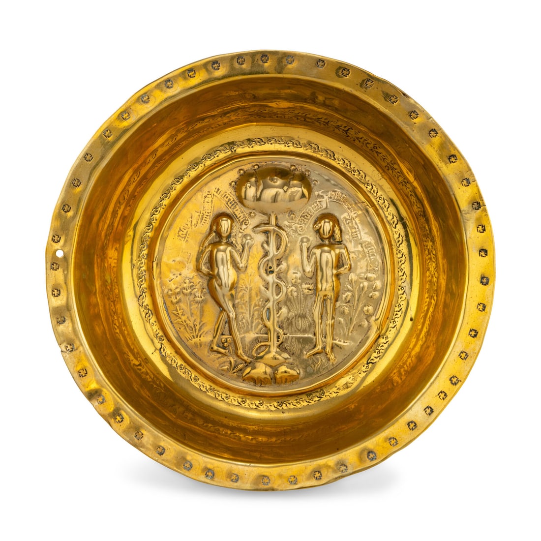 A Nuremburg Brass Adam and Eve Alms Bowl: A Nuremburg Brass Adam and Eve Alms Bowl Early 16th Century Height 2 1/2 x depth 10 3/4 inches. Property from the Collection of Robert and Roseann Drucker, Wilmette, IL This lot is located in