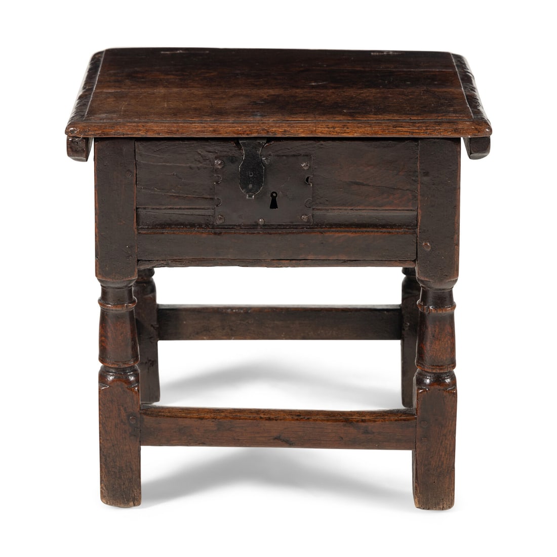 An English Oak Box Stool: An English Oak Box Stool 17th Century Height 17 1/4 x width 17 3/8 x depth 14 3/8 inches. Property from the Collection of Robert and Roseann Drucker, Wilmette, IL This lot is located in Chicago.
