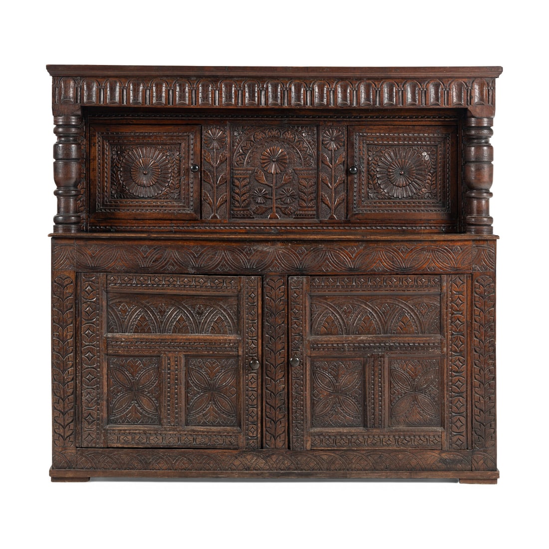 A Charles II Oak Press Cupboard: A Charles II Oak Press Cupboard Second Half 17th Century Height 56 x width 60 3/4 x depth 23 3/4. Property from the Estate of Audrey and Philip Rietveld, Crete, Illinois This lot is located in Chicago