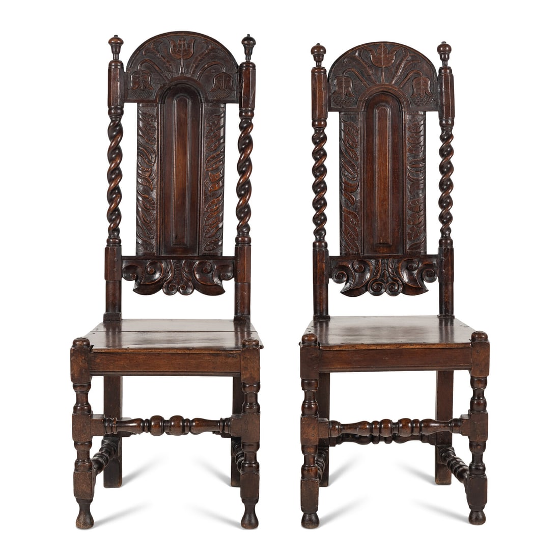 A Matched Pair of Charles II Carved Oak Side Chairs: A Matched Pair of Charles II Carved Oak Side Chairs Lancashire, Mid 17th Century Height 48 1/2 x width 19 x depth 16 inches. Property from the Collection of Robert and Roseann Drucker, Wilmette, IL Th