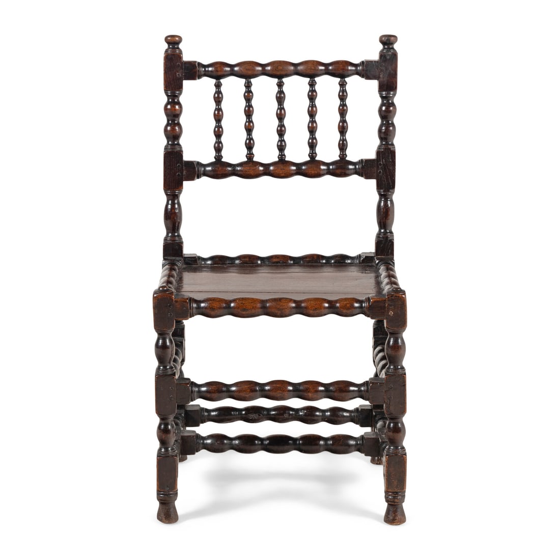A Turned Oak Side Chair: A Turned Oak Side Chair Second Half 17th Century Height 36 1/2 x width 19 3/8 x depth 17 inches. Property from the Collection of Robert and Roseann Drucker, Wilmette, IL This lot is located in