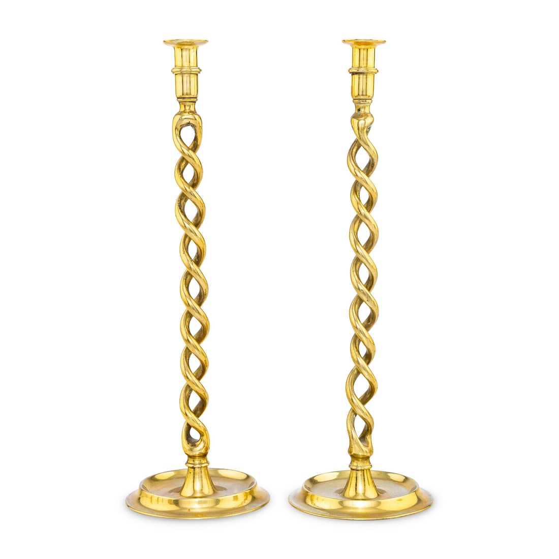 A Large Pair of English Brass Barleytwist Candlesticks: A Large Pair of English Brass Barleytwist Candlesticks Second Half 19th Century Height 19 3/4 inches. Property from the Collection of Robert and Roseann Drucker, Wilmette, IL This lot is located in