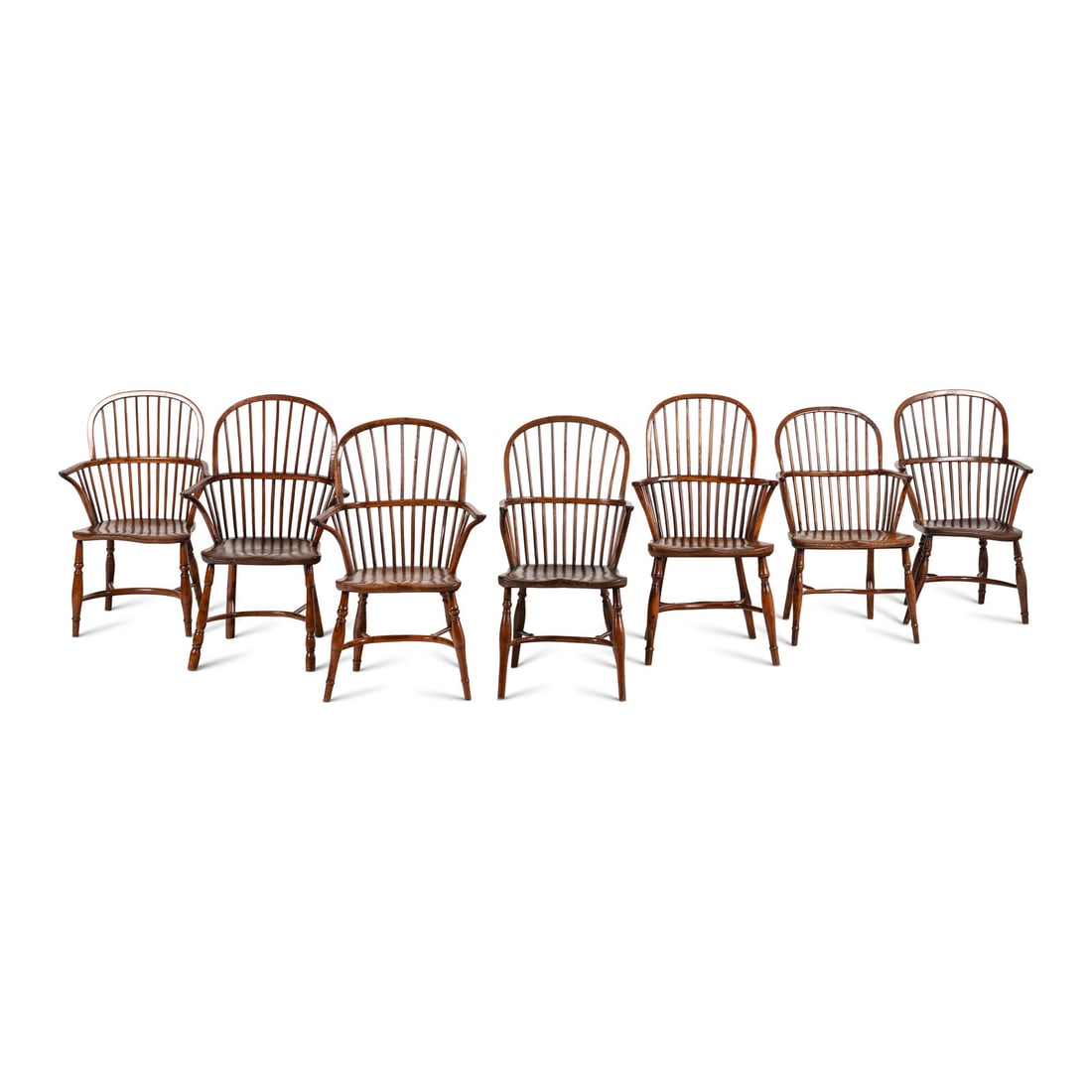 An Assembled Set of Seven Yew Wood Windsor Chairs: An Assembled Set of Seven Yew Wood Windsor Chairs Late 18th Century Height of largest 39 3/4 x width 25 1/2 x depth 22 1/2 inches. Property from the Collection of Robert and Roseann Drucker,
