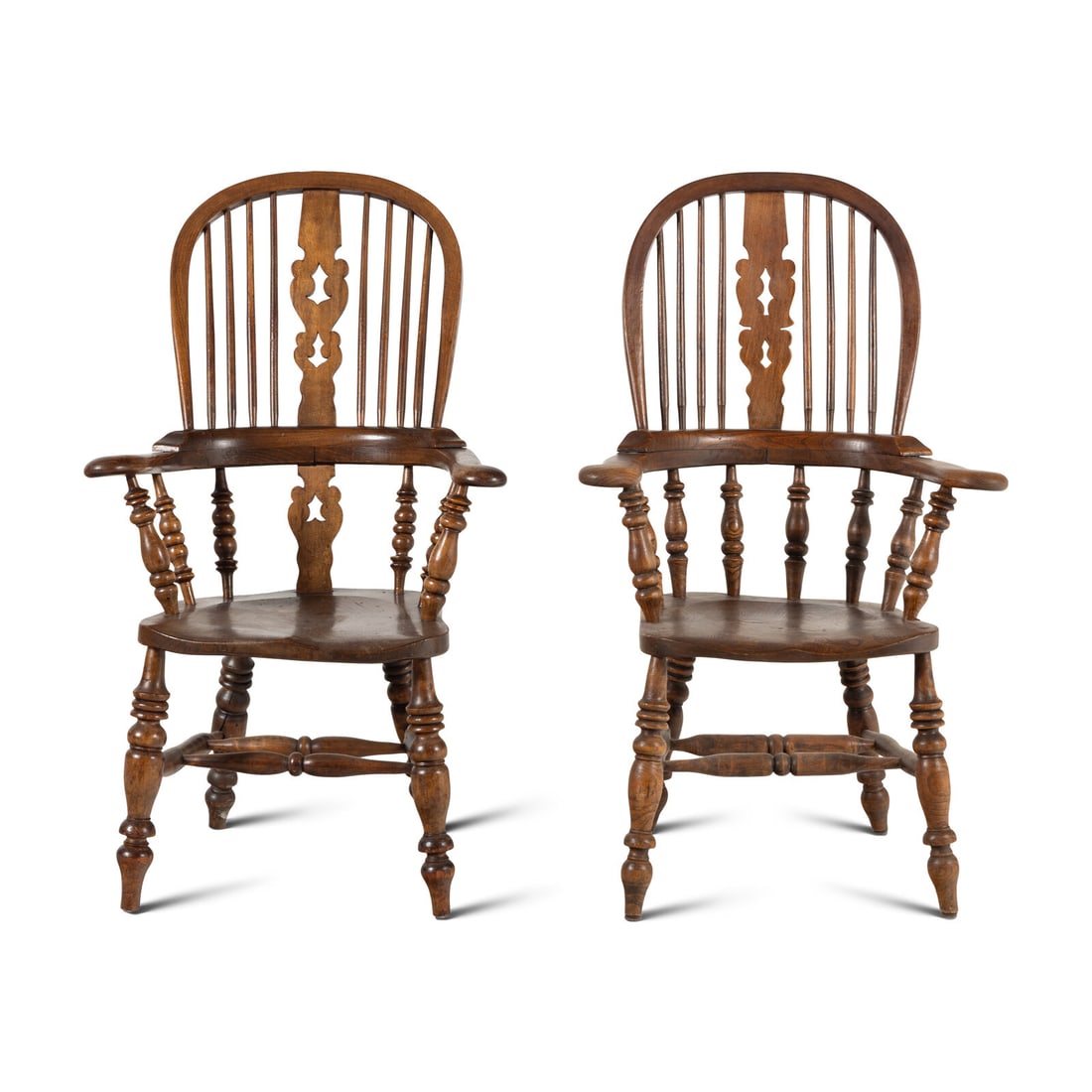 A Matched Pair of Oak Windsor Chairs: A Matched Pair of Oak Windsor Chairs 19th Century Height 45 x width 27 x depth 22 inches. Property from the Estate of Audrey and Philip Rietveld, Crete, Illinois This lot is located in Chicago.