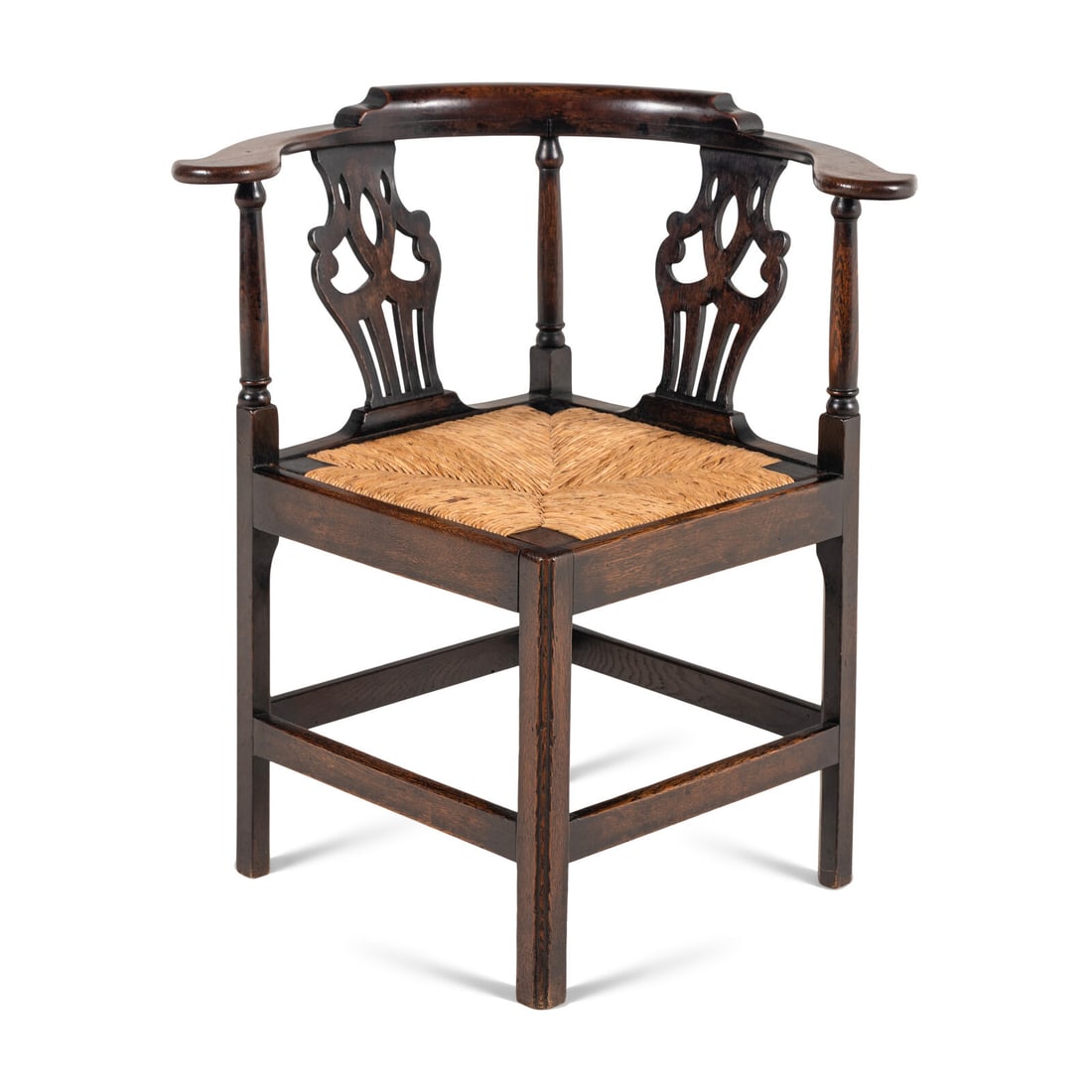 A George II Oak Corner Chair: A George II Oak Corner Chair Mid 18th Century Height 30 1/2 x width 28 1/2 x depth 24 1/2 inches. Property from the Collection of Robert and Roseann Drucker, Wilmette, IL This lot is located in
