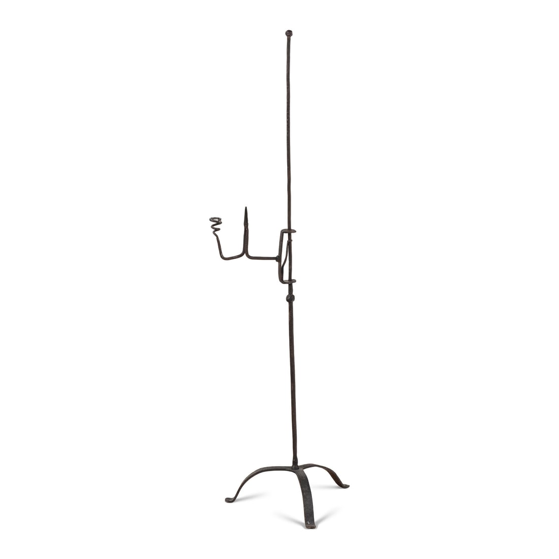 A Wrought Iron Composite Candlestick and Rush Light Stand: A Wrought Iron Composite Candlestick and Rush Light Stand First Quarter 18th Century Height 50 inches. Property from the Collection of Robert and Roseann Drucker, Wilmette, IL This lot is located in