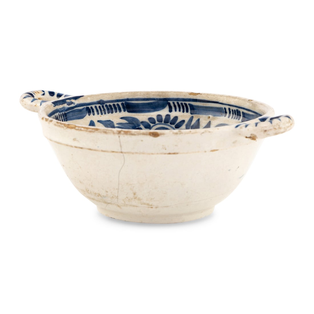 A Dutch Delft Porringer: A Dutch Delft Porringer Last Quarter 17th Century Height 3 x width over handles 8 1/2 x depth 6 1/2 inches. Property from the East Coast Collection of Peter S. Ely This lot is located in Chicago. Prov