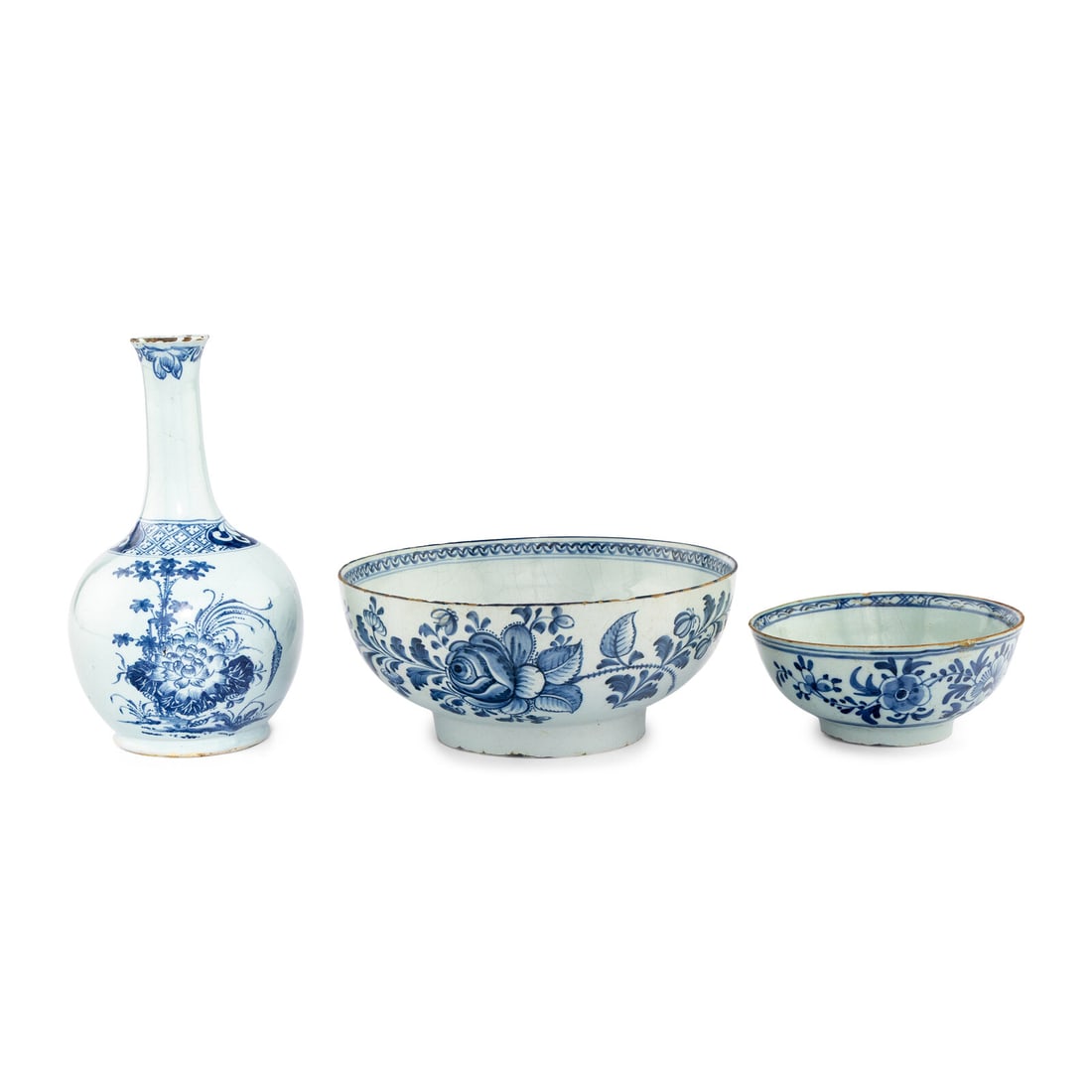 A Collection of Three English Delftware Blue and White Articles: A Collection of Three English Delftware Blue and White Articles 18th Century comprising two bowls and one Liverpool water bottle. Height of water bottle 9 inches. Property from the East Coast Collecti