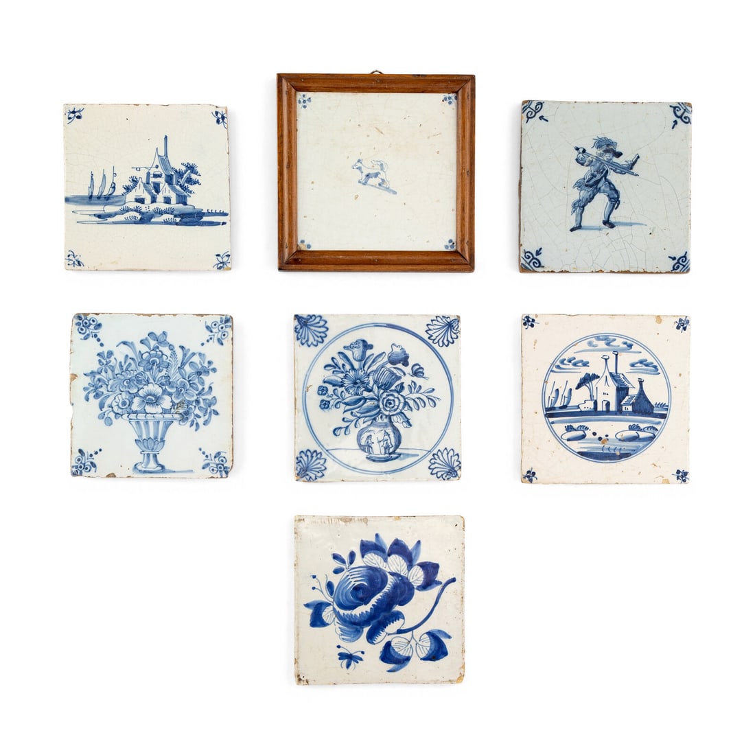 A Collection of Seven Delft Blue and White Decorated Tiles: A Collection of Seven Delft Blue and White Decorated Tiles 18th Century including one framed example. Framed example 6 x 6 inches. Property from the East Coast Collection of Peter S. Ely This lot is
