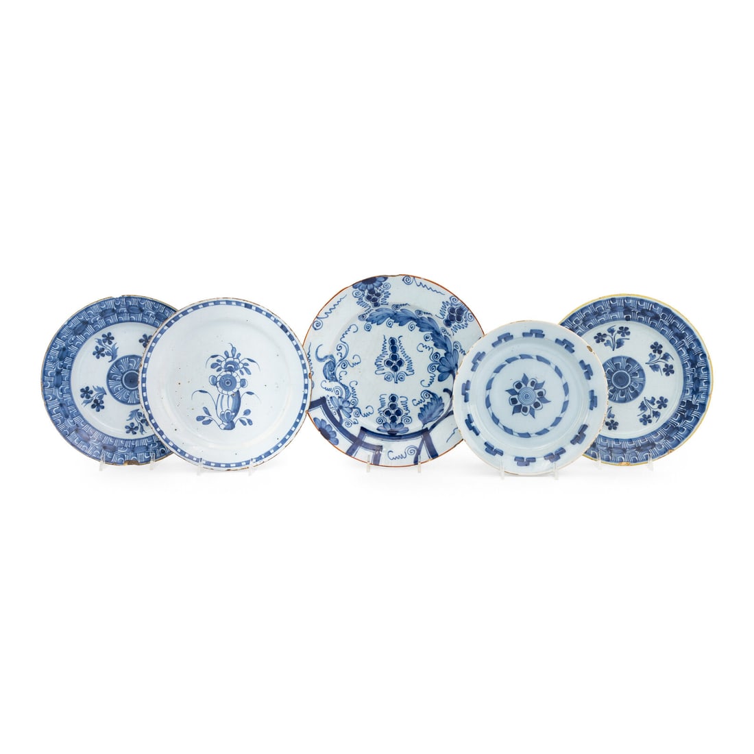 A Collection of Five English Blue and White Delftware Articles: A Collection of Five English Blue and White Delftware Articles 18th Century Diameter of largest 10 inches. Property from the East Coast Collection of Peter S. Ely This lot is located in Chicago. Prove