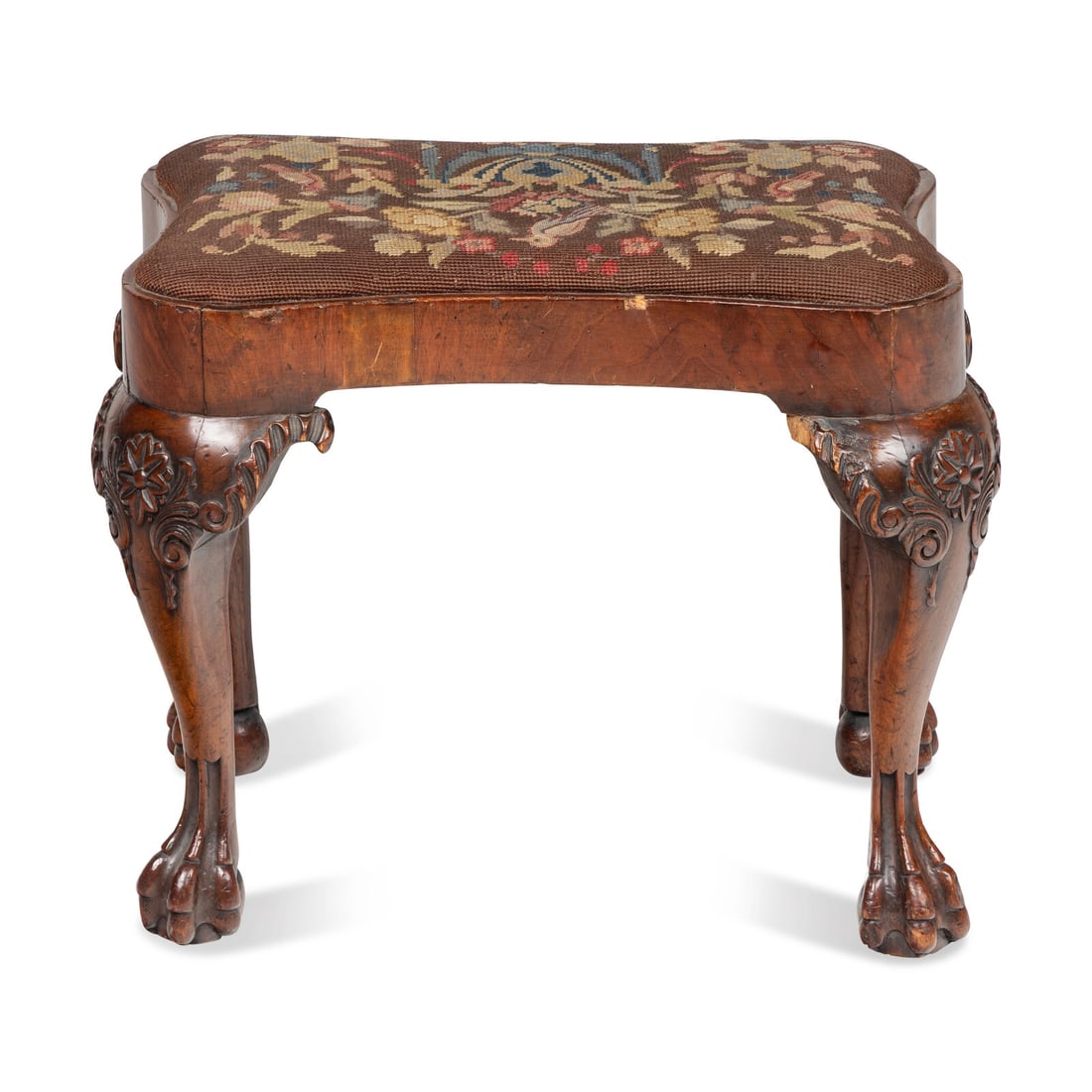 A George I Walnut Stool: A George I Walnut Stool Early 18th Century Height 17 1/2 x width 22 1/2 x depth 16 1/2 inches. Property from the Estate of Audrey and Philip Rietveld, Crete, Illinois This lot is located in Chicago.