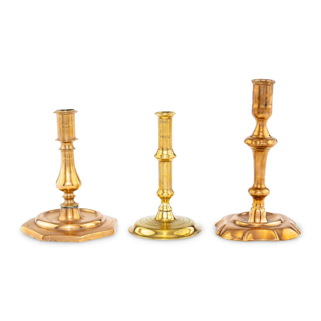 A Collection of Three Brass and Bell Metal Candlesticks (1 of 2)